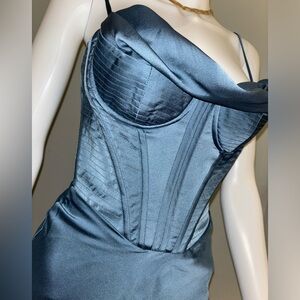 Get ready to turn heads in this stunning HOUSE OF CB Myrna Satin Corset Dress!